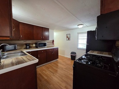 This 2 bed 2 bath home is located in Gateway MHP a 55+ Community - photo 9