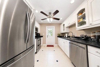 Welcome to this beautifully maintained CBS construction home - photo 18