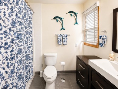 Just 1 block from the beach, this inviting first floor Ocean - photo 18