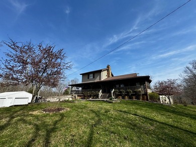 Beautiful 39+ acre farm with a spring-fed stocked pond, mature - photo 11