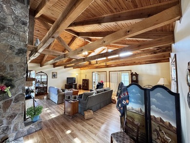 Beautiful 39+ acre farm with a spring-fed stocked pond, mature - photo 13