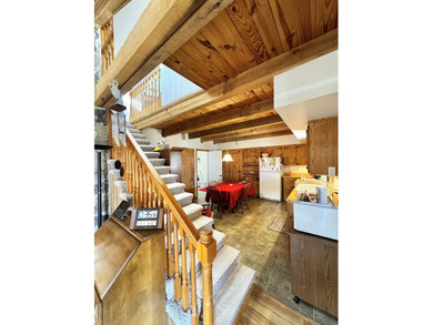 Beautiful 39+ acre farm with a spring-fed stocked pond, mature - photo 19