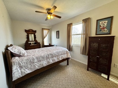 Beautiful 39+ acre farm with a spring-fed stocked pond, mature - photo 29