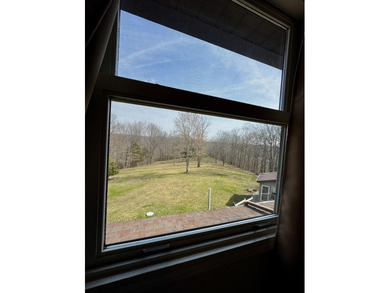 Beautiful 39+ acre farm with a spring-fed stocked pond, mature - photo 30
