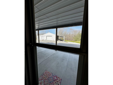 Beautiful 39+ acre farm with a spring-fed stocked pond, mature - photo 40