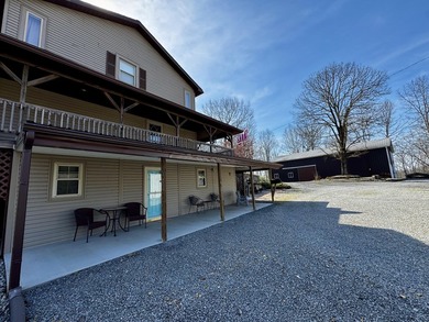 Beautiful 39+ acre farm with a spring-fed stocked pond, mature - photo 42