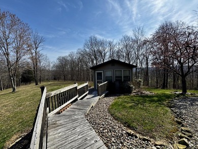 Beautiful 39+ acre farm with a spring-fed stocked pond, mature - photo 45