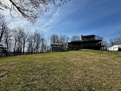 Beautiful 39+ acre farm with a spring-fed stocked pond, mature - photo 47