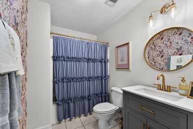 This beautifully updated 3-bedroom, 2-bath home offers the - photo 12