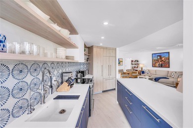 Iconic Bayfront living at the fully gated Palm Bay Towers with