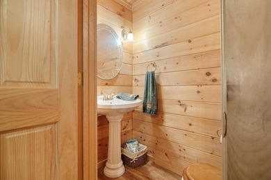 This stunning riverfront log home on the premier trout-filled - photo 14