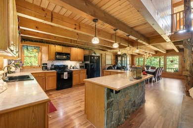 This stunning riverfront log home on the premier trout-filled - photo 15