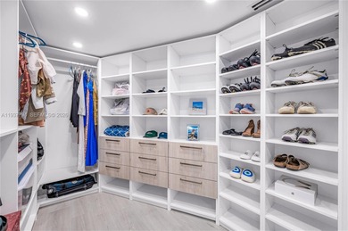 Iconic Bayfront living at the fully gated Palm Bay Towers with