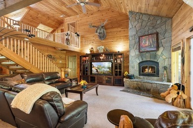 This stunning riverfront log home on the premier trout-filled - photo 17