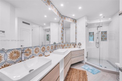 Iconic Bayfront living at the fully gated Palm Bay Towers with