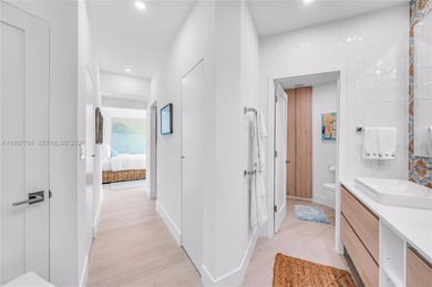 Iconic Bayfront living at the fully gated Palm Bay Towers with