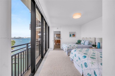 Iconic Bayfront living at the fully gated Palm Bay Towers with