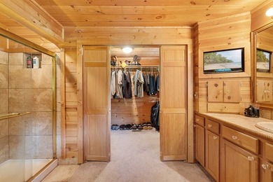 This stunning riverfront log home on the premier trout-filled - photo 27