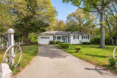 Tucked away on a shy half-acre backing directly onto peaceful - photo 1