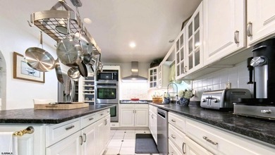 This very well-maintained home is tucked away on a quiet - photo 34