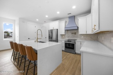 Experience modern luxury and effortless downtown living in this - photo 5