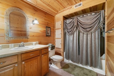 This stunning riverfront log home on the premier trout-filled - photo 36