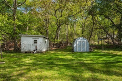 Tucked away on a shy half-acre backing directly onto peaceful - photo 8