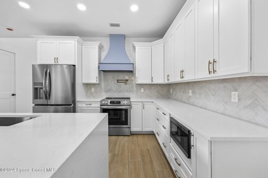 Experience modern luxury and effortless downtown living in this - photo 9