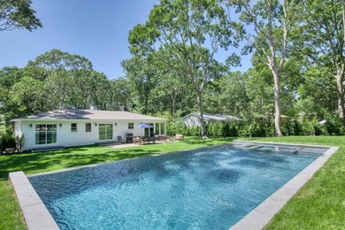 Nestled just one mile from the heart of Sag Harbor Village, this - photo 1