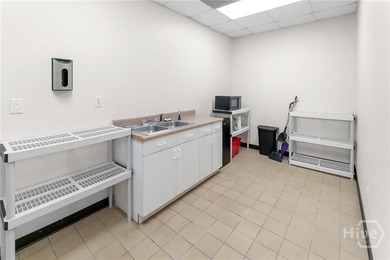 Flex space with multiple offices, break room, 2 restrooms and - photo 17