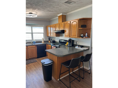 This beautiful 1,494 sq. ft. home is located in a gated 55+ - photo 4