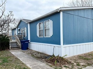 Affordable coastal living in desirable Flour Bluff! Situated on - photo 1