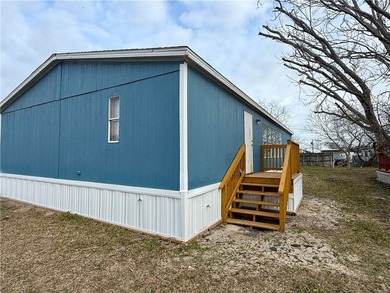 Affordable coastal living in desirable Flour Bluff! Situated on - photo 2