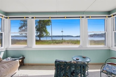 Nestled along the north shore of Portage Lake with 68 feet of - photo 11