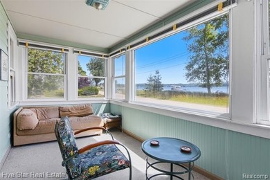 Nestled along the north shore of Portage Lake with 68 feet of - photo 12