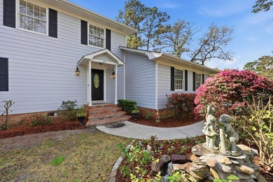 Tucked on a quiet cul-de-sac just 2 miles from the beach, this - photo 16