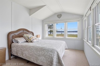 Nestled along the north shore of Portage Lake with 68 feet of - photo 20