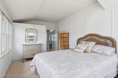 Nestled along the north shore of Portage Lake with 68 feet of - photo 21