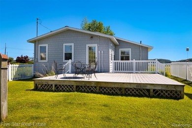 Nestled along the north shore of Portage Lake with 68 feet of - photo 25