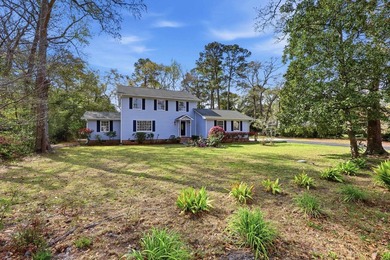Tucked on a quiet cul-de-sac just 2 miles from the beach, this - photo 32