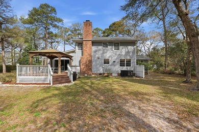 Tucked on a quiet cul-de-sac just 2 miles from the beach, this - photo 48