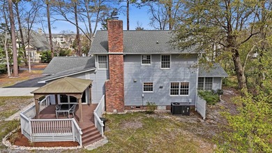 Tucked on a quiet cul-de-sac just 2 miles from the beach, this - photo 49