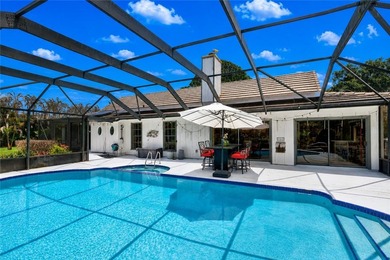 Timeless Florida charm meets golf course views in this 4BR/3BA - photo 31