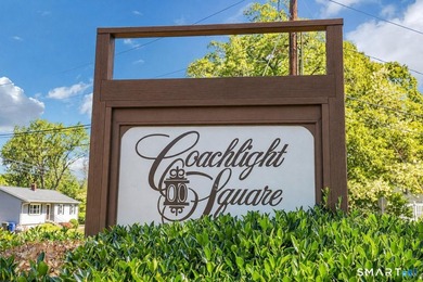 Beautifully updated ground-level ranch style end-unit in - photo 2