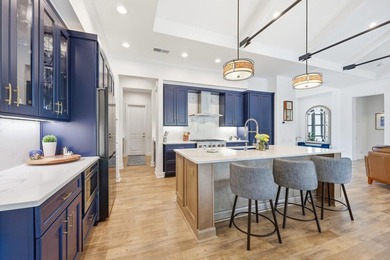 Experience refined coastal living in this custom-built 3-4 - photo 16
