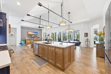 Experience refined coastal living in this custom-built 3-4 - photo 18
