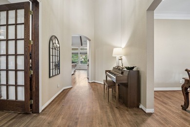 Nestled on a quiet cul-de-sac in the highly sought-after golf - photo 3