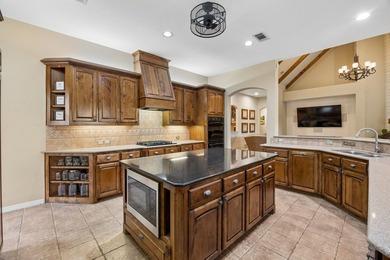 Nestled on a quiet cul-de-sac in the highly sought-after golf - photo 10