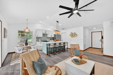 Set on an oversized .46-acre lot with mature trees, this - photo 9