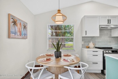 Set on an oversized .46-acre lot with mature trees, this - photo 10